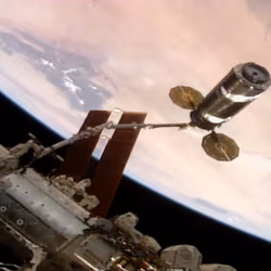 News image: Robotic Arm Maneuvering Cygnus for Station Installation