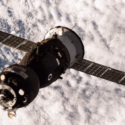 News image: Three Crewmates Aboard Soyuz Approaching Station for Docking