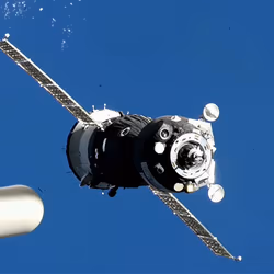 News image: Three New Crew Members Aboard Soyuz Dock to Station